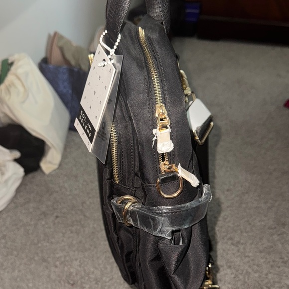 Sleek Black Backpack with Gold Zippers - Picture 4 of 10